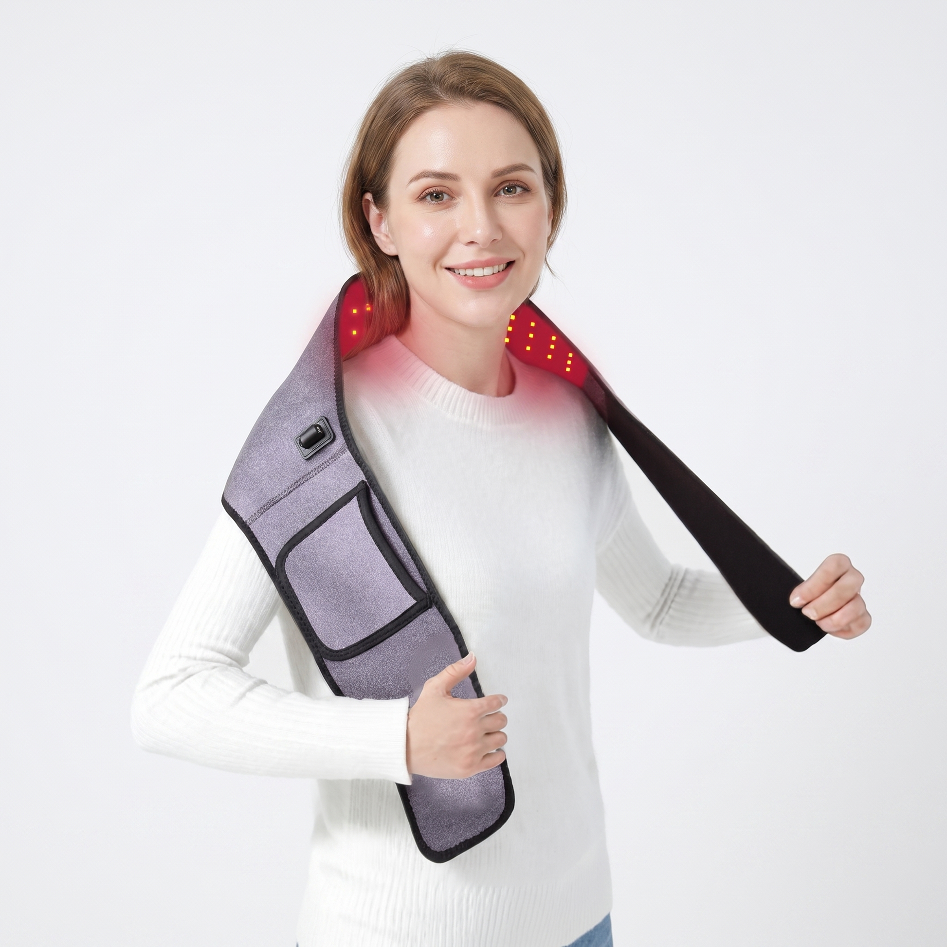 Woman relaxing with the LUNA far-infrared red-light heating wrap draped over her shoulders